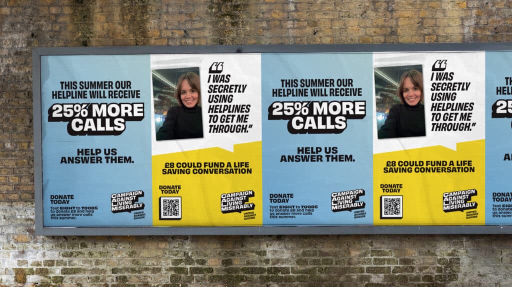 Street billboard displaying a Campaign Against Living Miserably (CALM) ad stating "This summer our helpline will receive 25% more calls. Help us answer them. Donate today.