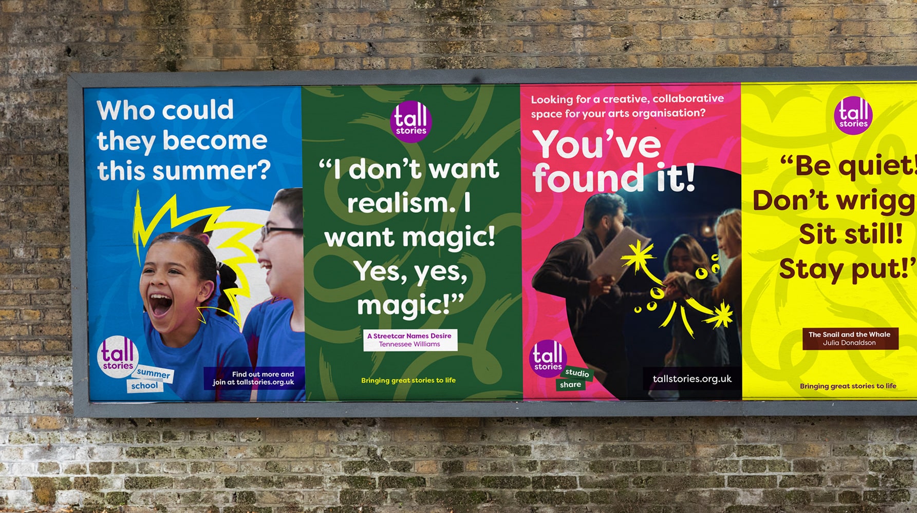 Street-level billboard featuring four colourful posters for Tall Stories theatre company. The posters promote summer school and productions using bold graphics, playful type, and energetic quotes. One reads “Who could they become this summer?” beside excited children, while another shows a Tennessee Williams quote: “I don’t want realism. I want magic!”