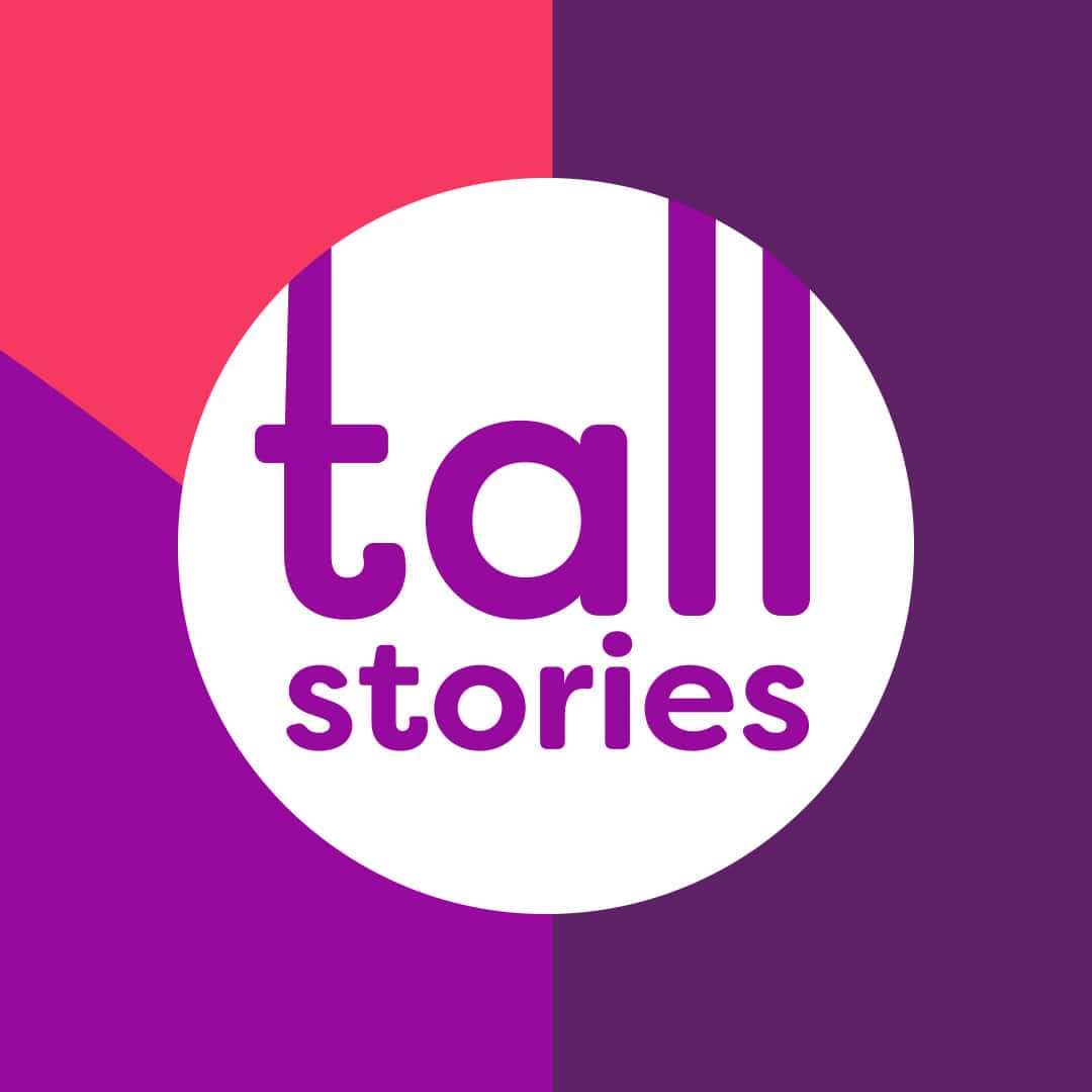 Tall Stories logo in a white circle with lowercase purple lettering on a vibrant colour-block background in shades of magenta, violet, and plum.