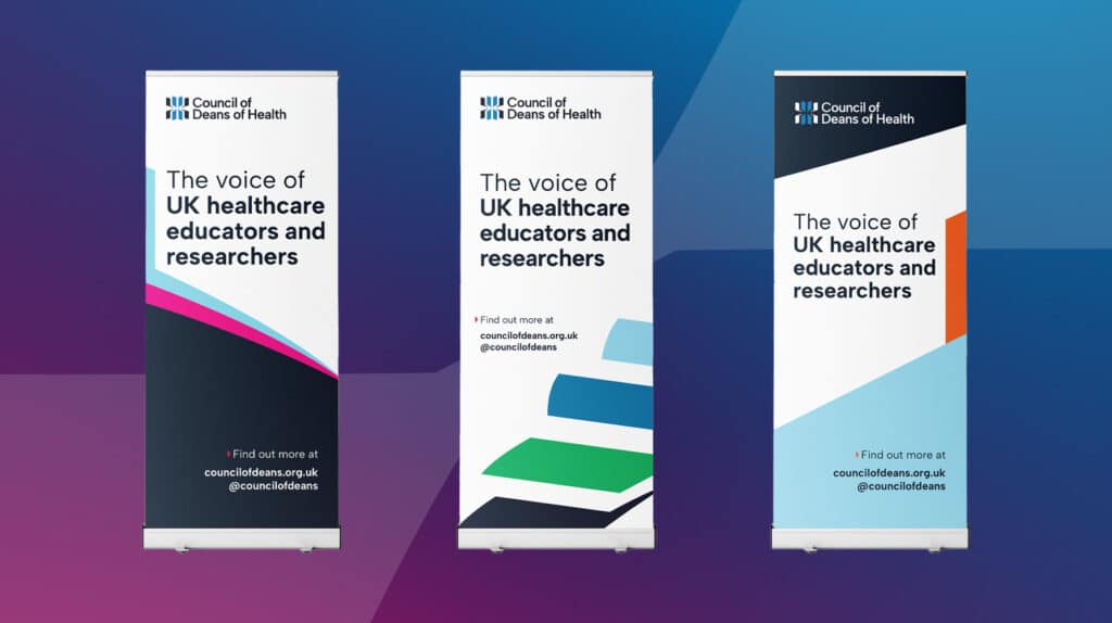 Three pull-up banners for the Council of Deans of Health, each featuring the tagline “The voice of UK healthcare educators and researchers” with different bold graphic designs and colour palettes, set against a gradient blue and purple background.